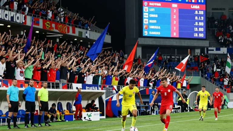 Exciting soccer match capturing real-time kết quả bóng đá updates with fans and players in action